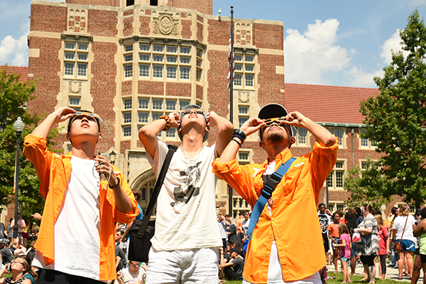 Eclipse viewing party on Ayres Hall lawn