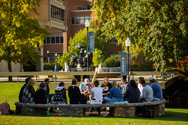 A class meets in McClung Plaza.